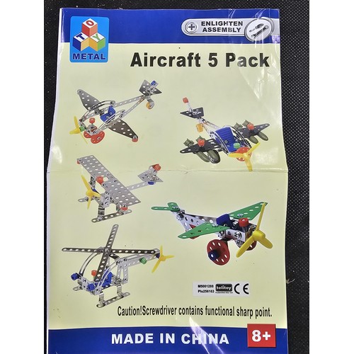 150 - A box containing a quantity of Meccano style Metal Toy pieces complete with instructions for 5x diff... 
