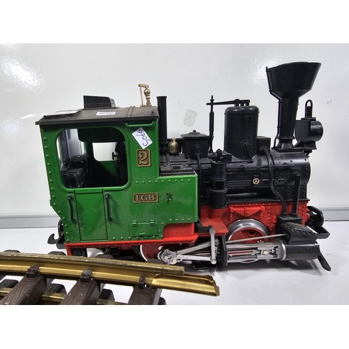 151 - A good quality heavy locomotive with a quantity of track, removed from a shop, used to travel around... 