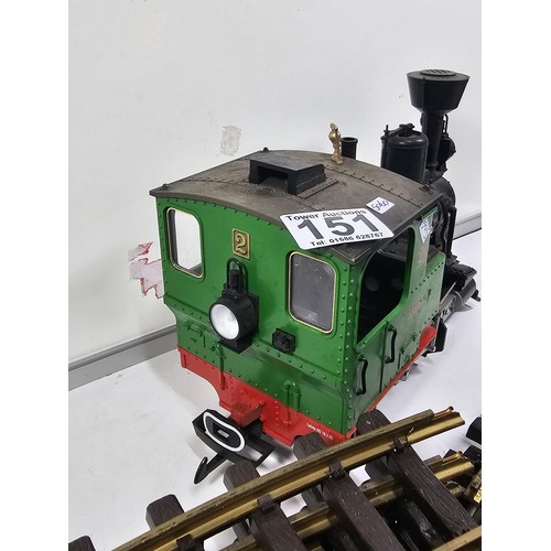 151 - A good quality heavy locomotive with a quantity of track, removed from a shop, used to travel around... 