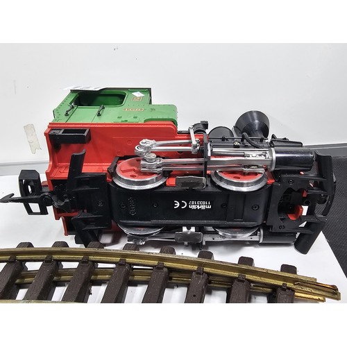 151 - A good quality heavy locomotive with a quantity of track, removed from a shop, used to travel around... 