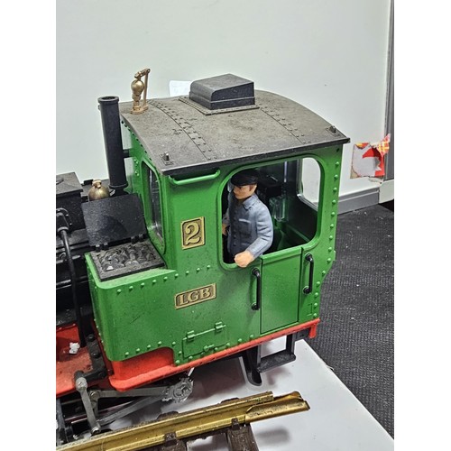 151 - A good quality heavy locomotive with a quantity of track, removed from a shop, used to travel around... 