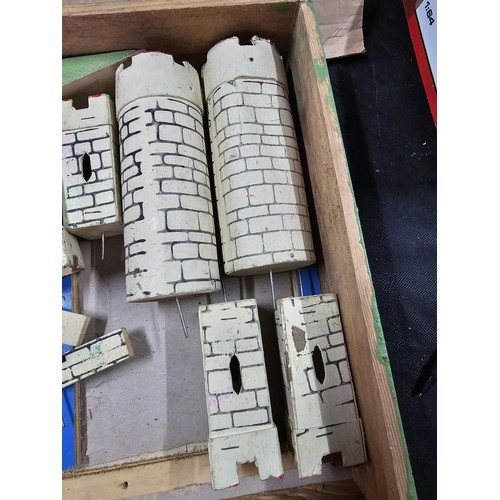 153 - A good quality vintage Tri-ang fort set the fort is made of wood and comes in a wooden box, all piec... 