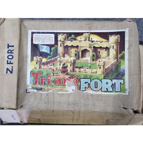 153 - A good quality vintage Tri-ang fort set the fort is made of wood and comes in a wooden box, all piec... 