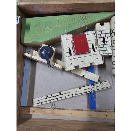 153 - A good quality vintage Tri-ang fort set the fort is made of wood and comes in a wooden box, all piec... 