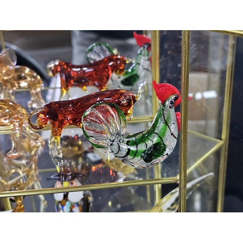 154 - 5x glass and metal small display cases to include 2x hexagonal shelf cases with three shelves contai... 