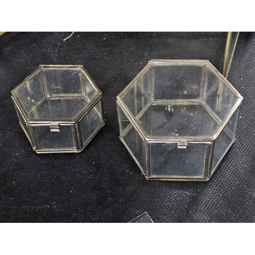 154 - 5x glass and metal small display cases to include 2x hexagonal shelf cases with three shelves contai... 