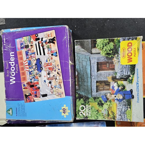 134 - A quantity of games to include numbers Mastermind, 2x diecast cars a plated Queen Anne plate, a boxe... 