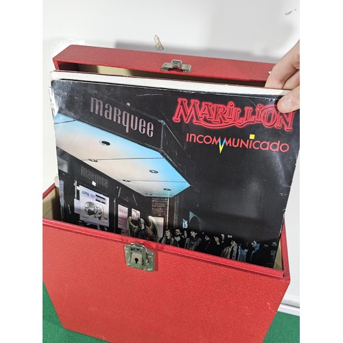 185 - A red record case containing a quantity of over 40x LP's of assorted genre and artists to include Wh... 