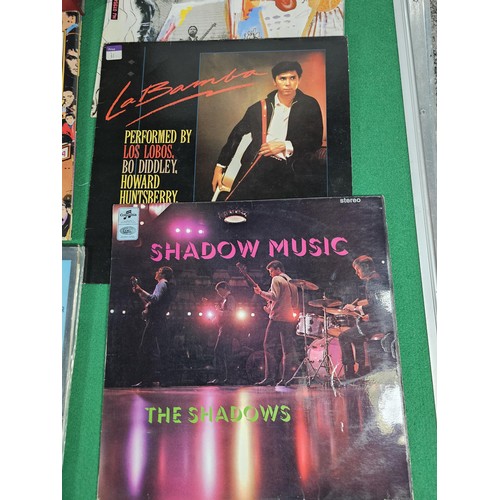 186 - A red box containing a quantity of over 40x LP's of assorted genre and artists to include The Shadow... 