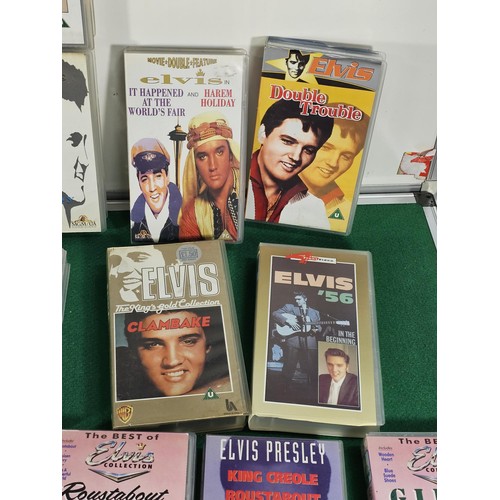 187 - A box containing a large quantity of 42x Elvis related VHS tapes to include Fun in Acapulco, Evis Co... 