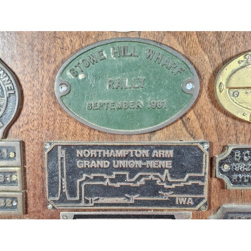 211 - An International Waterways Association (IWA) Commemorative plaque display, mounted on a hardwood boa... 