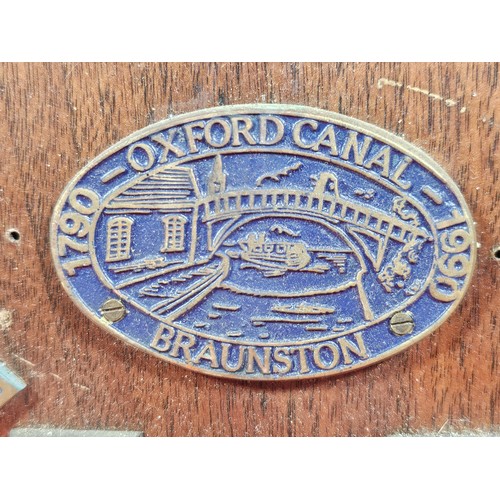 211 - An International Waterways Association (IWA) Commemorative plaque display, mounted on a hardwood boa... 