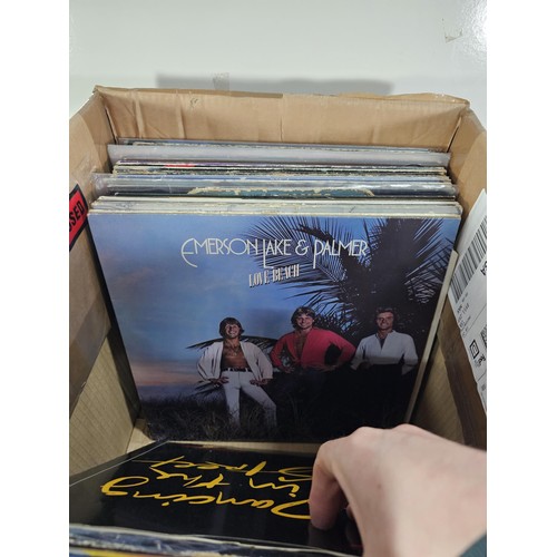 190 - A box containing a quantity of assorted LP's of different genre, to include Wings, Pink Floyd, David... 