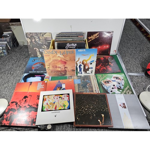 195 - Crate containing a quantity of assorted LP's of various genre to include U2, Adam Ant, Slade, ABBA, ... 