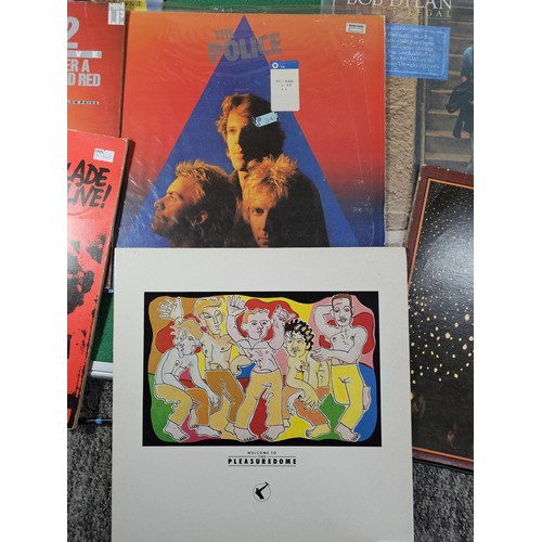 195 - Crate containing a quantity of assorted LP's of various genre to include U2, Adam Ant, Slade, ABBA, ... 
