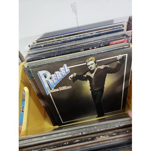 195 - Crate containing a quantity of assorted LP's of various genre to include U2, Adam Ant, Slade, ABBA, ... 