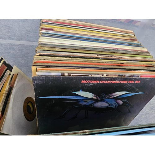 196 - Large crate containing a large quantity of Lp's and 45's of various genre and artists to include Pau... 