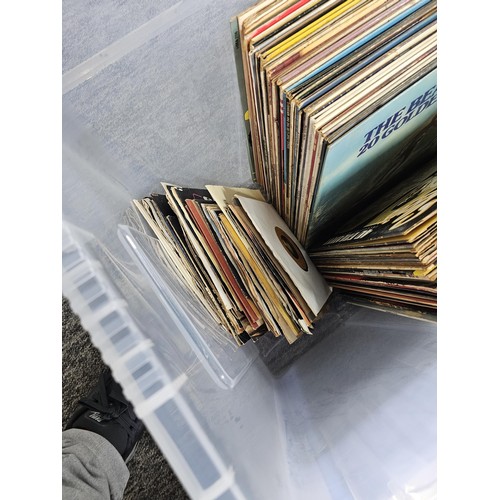 196 - Large crate containing a large quantity of Lp's and 45's of various genre and artists to include Pau... 