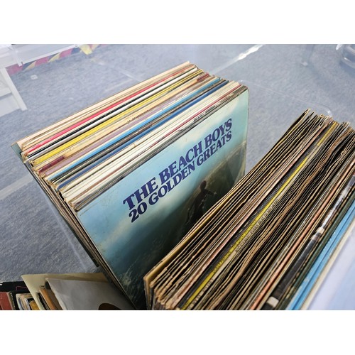 196 - Large crate containing a large quantity of Lp's and 45's of various genre and artists to include Pau... 