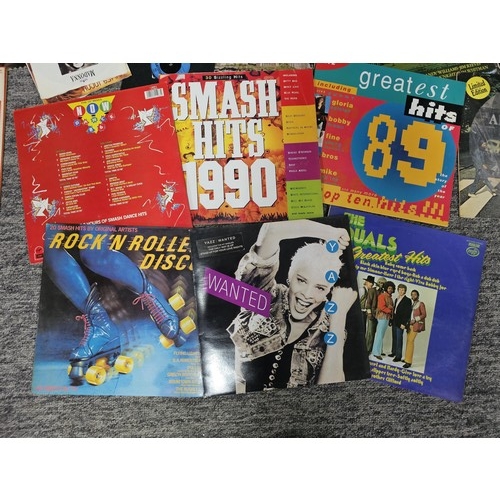 196 - Large crate containing a large quantity of Lp's and 45's of various genre and artists to include Pau... 