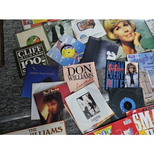 196 - Large crate containing a large quantity of Lp's and 45's of various genre and artists to include Pau... 