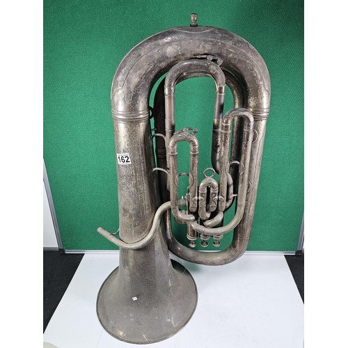 162 - A vintage Class A three valve silver plated Tuba by Boosey & Co, London, has a clear makers stam... 