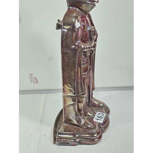 163 - A good quality Bilson enamelled iridescent fireside knight formed companion stand, in good order wit... 