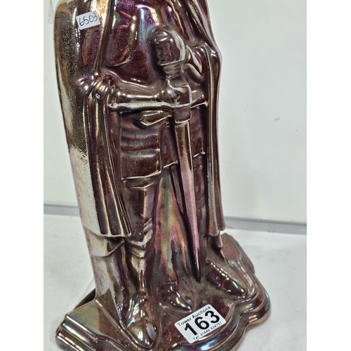 163 - A good quality Bilson enamelled iridescent fireside knight formed companion stand, in good order wit... 