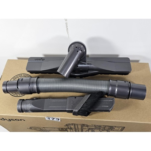 173 - A box containing a quantity of Dyson accessories to include 3x rotating brush heads, additional brus... 