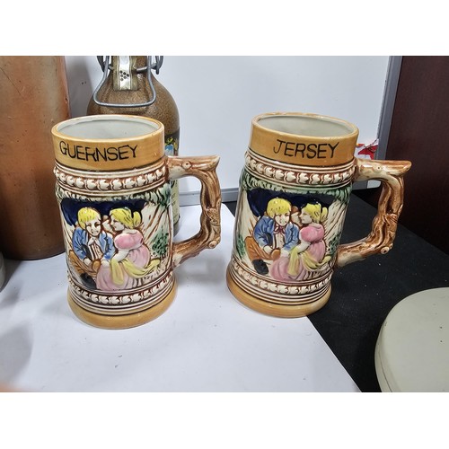 197 - A box containing a quantity of assorted collectable German tankards and steins, to include a earthen... 
