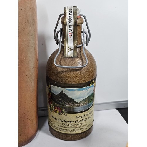 197 - A box containing a quantity of assorted collectable German tankards and steins, to include a earthen... 