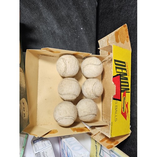 180 - Large quantity of collectables to include 2x boxes of vintage 1960's tennis balls by Dunlop, a box o... 