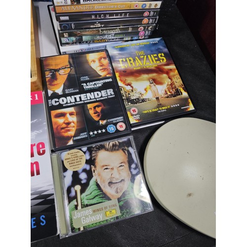 182 - A collection of books and DVD's and CD's to include Brokeback Mountain, The Contender, The Hunter et... 