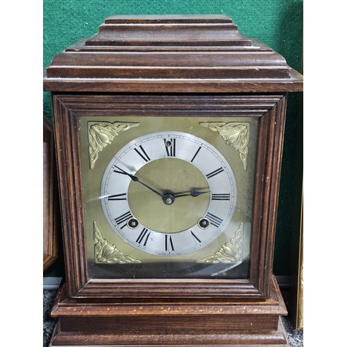 200 - Small quantity of clocks to include a good quality wooden mantle clock striking on a coiled gong com... 