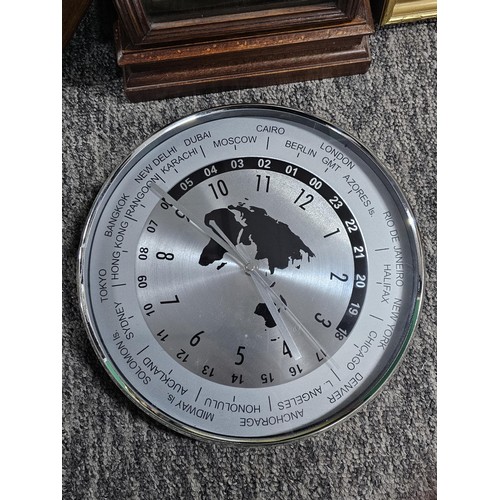 200 - Small quantity of clocks to include a good quality wooden mantle clock striking on a coiled gong com... 