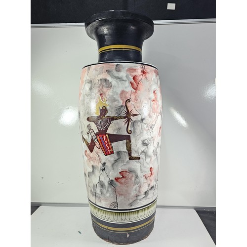 203 - A large earthenware floor standing vase with hand painted decoration to the side showing the image o... 