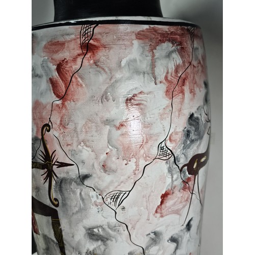 203 - A large earthenware floor standing vase with hand painted decoration to the side showing the image o... 