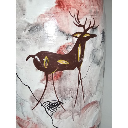 203 - A large earthenware floor standing vase with hand painted decoration to the side showing the image o... 