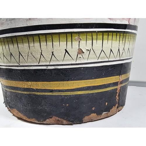 203 - A large earthenware floor standing vase with hand painted decoration to the side showing the image o... 