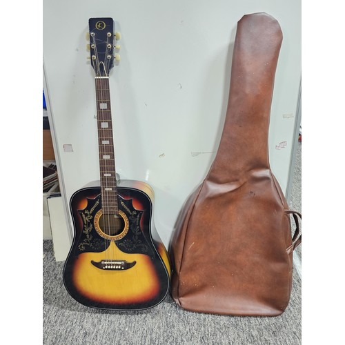 205 - A Kay 310 vintage dreadnought acoustic guitar, made in Japan circa 1970's, has the decorative bat wi... 
