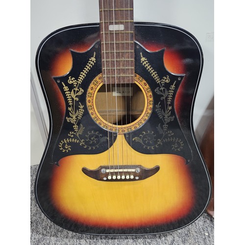 205 - A Kay 310 vintage dreadnought acoustic guitar, made in Japan circa 1970's, has the decorative bat wi... 