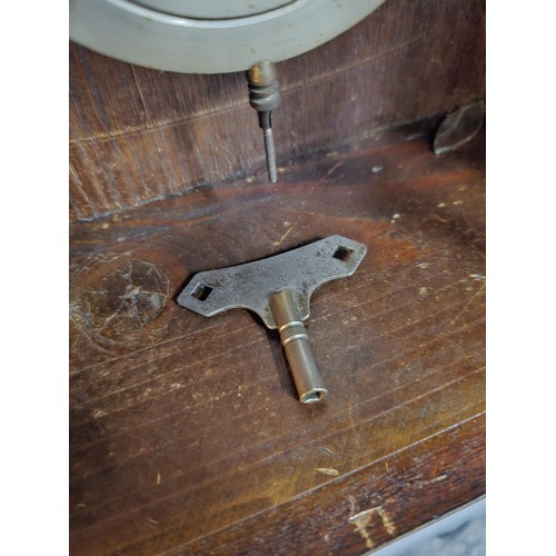 208 - A vintage Vienna wall clock with a metal dial stamped Fear's Ltd Bristol Bridge made in Baden. The c... 