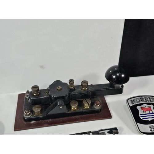 213 - A collection of car related items to include a Rover Viking bonnet mount, a Sunbeam Talbot bonnet ba... 