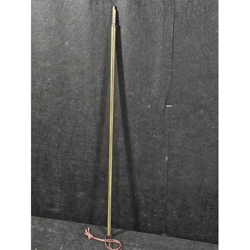 214 - A good quality vintage brass ecclesiastical pillar candle lighter in good order with a red velvet ba... 