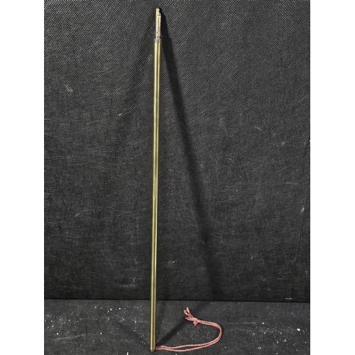 214 - A good quality vintage brass ecclesiastical pillar candle lighter in good order with a red velvet ba... 