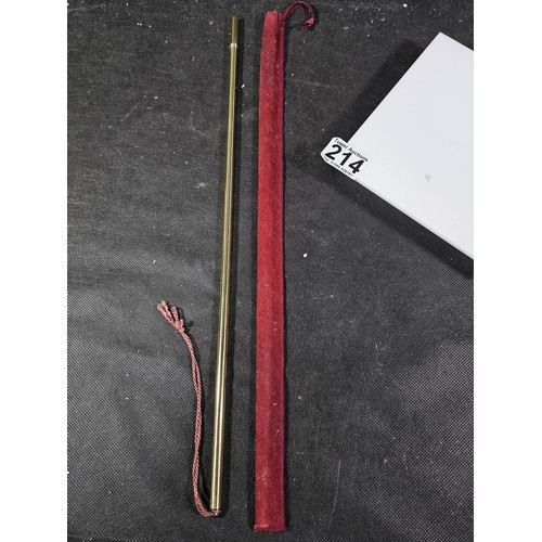 214 - A good quality vintage brass ecclesiastical pillar candle lighter in good order with a red velvet ba... 