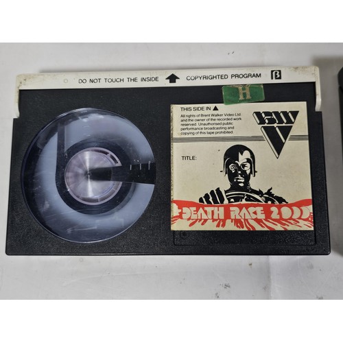 220 - 2x collectable video cassettes to include a Betamax Death Race 2000 by Brent Walker Video and an ear... 