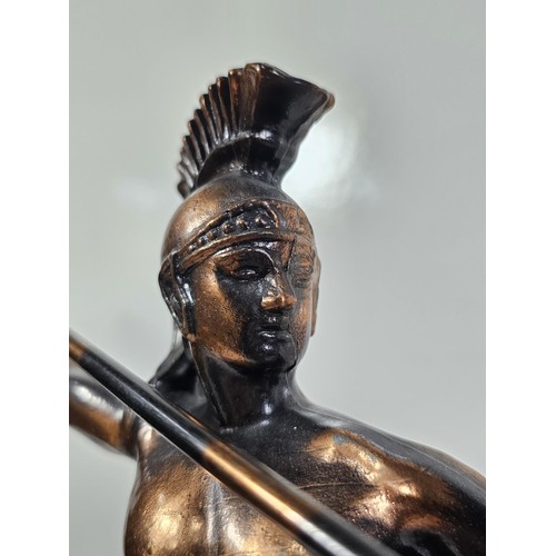 225 - A good quality bronze effect resin figure of a Spartan Gladiator complete with spear and shield, the... 