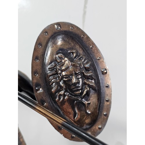 225 - A good quality bronze effect resin figure of a Spartan Gladiator complete with spear and shield, the... 