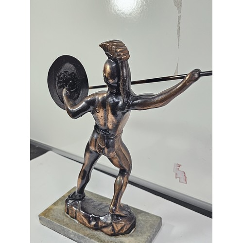 225 - A good quality bronze effect resin figure of a Spartan Gladiator complete with spear and shield, the... 